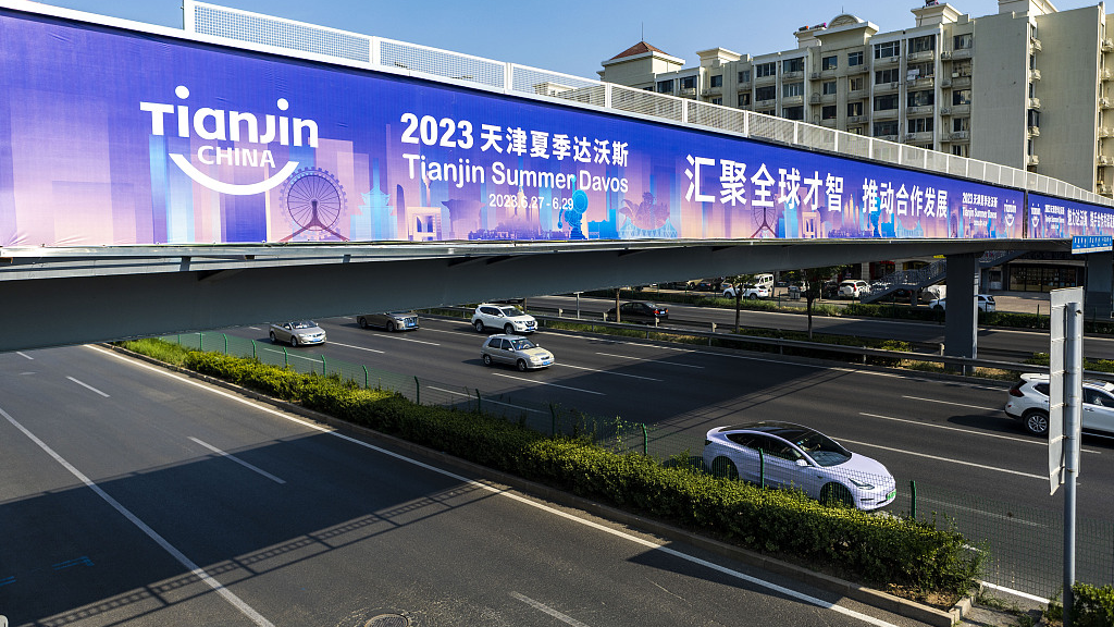 A banner of the Summer Davos Forum 2023 on an overpass in north China's Tianjin Municipality, June 26, 2023. /CFP