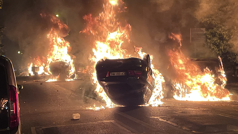 Burning vehicles are seen during clashes between protesters and police in Nanterre, Paris suburb, France, June 29, 2023. /CFP