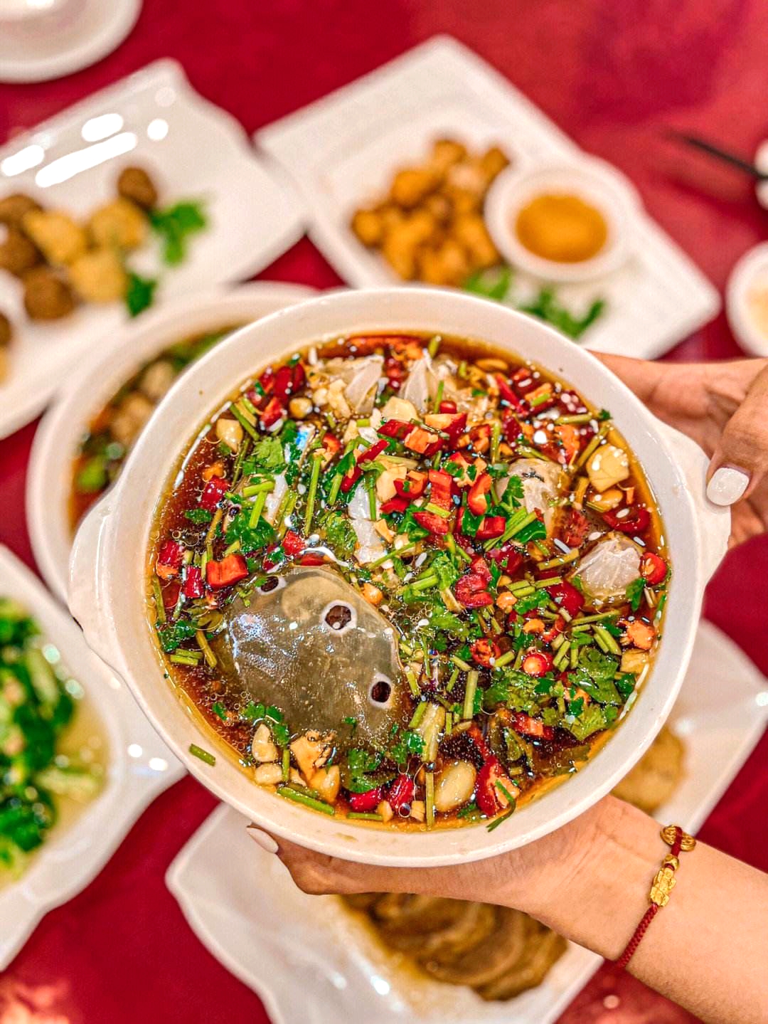 Raw pickled seafood made from fresh seafood marinated in citrus juices such as lemon or lime and spiced with chili peppers is popular in southern China. /Photo provided to CGTN