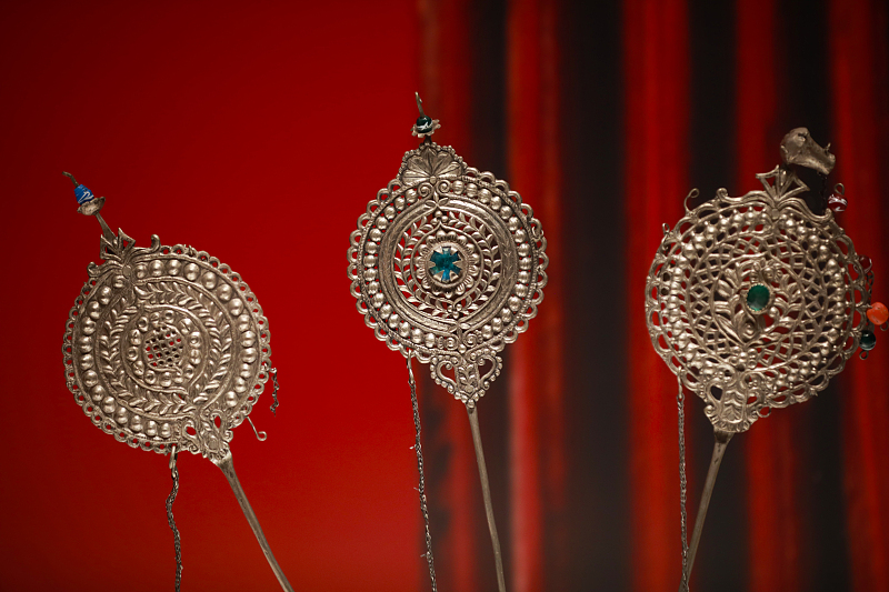 Silver brooches from Peru go on display at the Shaanxi History Museum in Xi'an, Shaanxi Province, June 27, 2023. /CFP