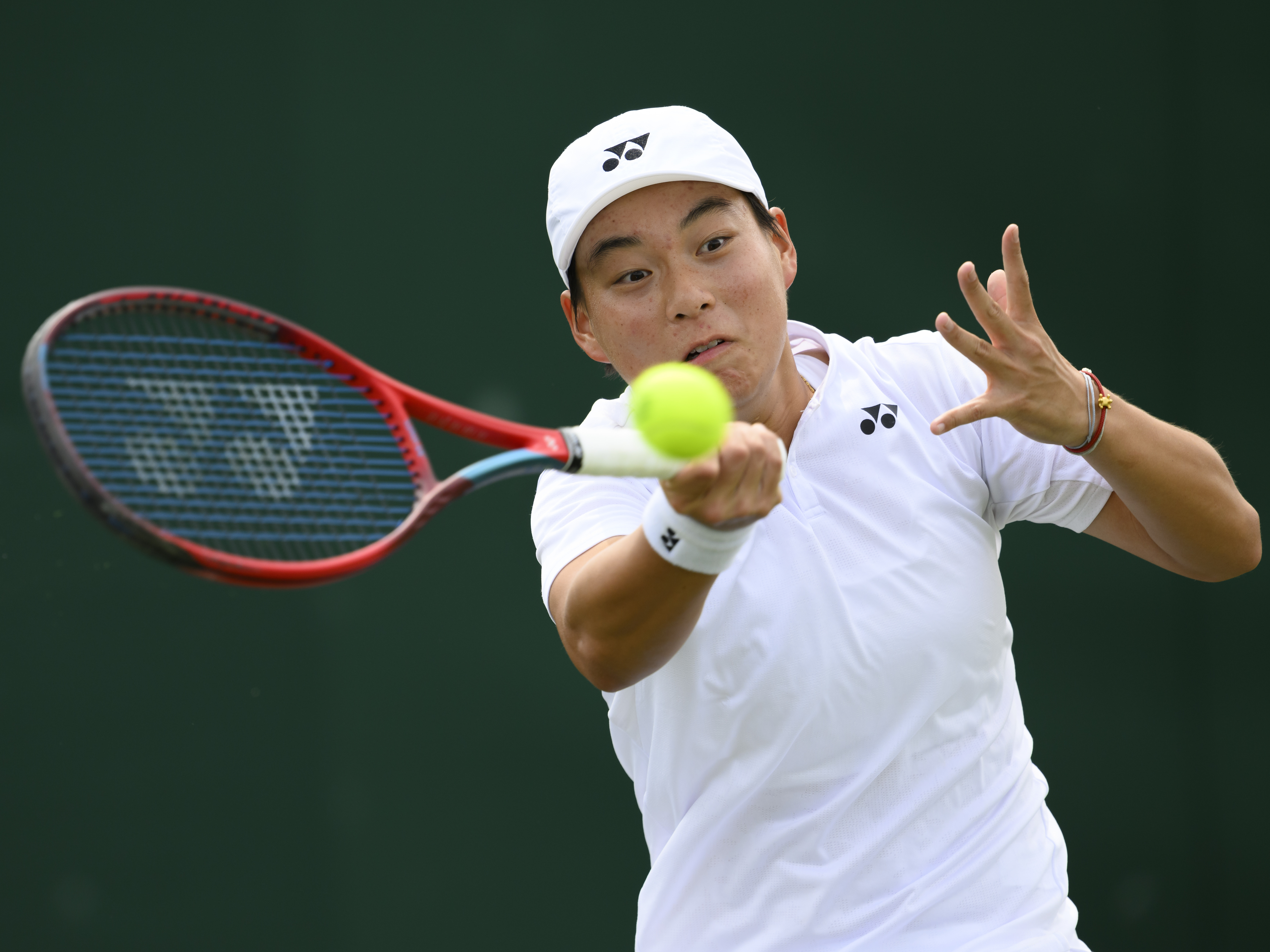 Bai Zhuoxuan of China competes in the Wimbledon Championships women's singles qualifying match against Anna Brogan of Britain at Community Sport Centre Roehampton in London, England, June 29, 2023. /CFP