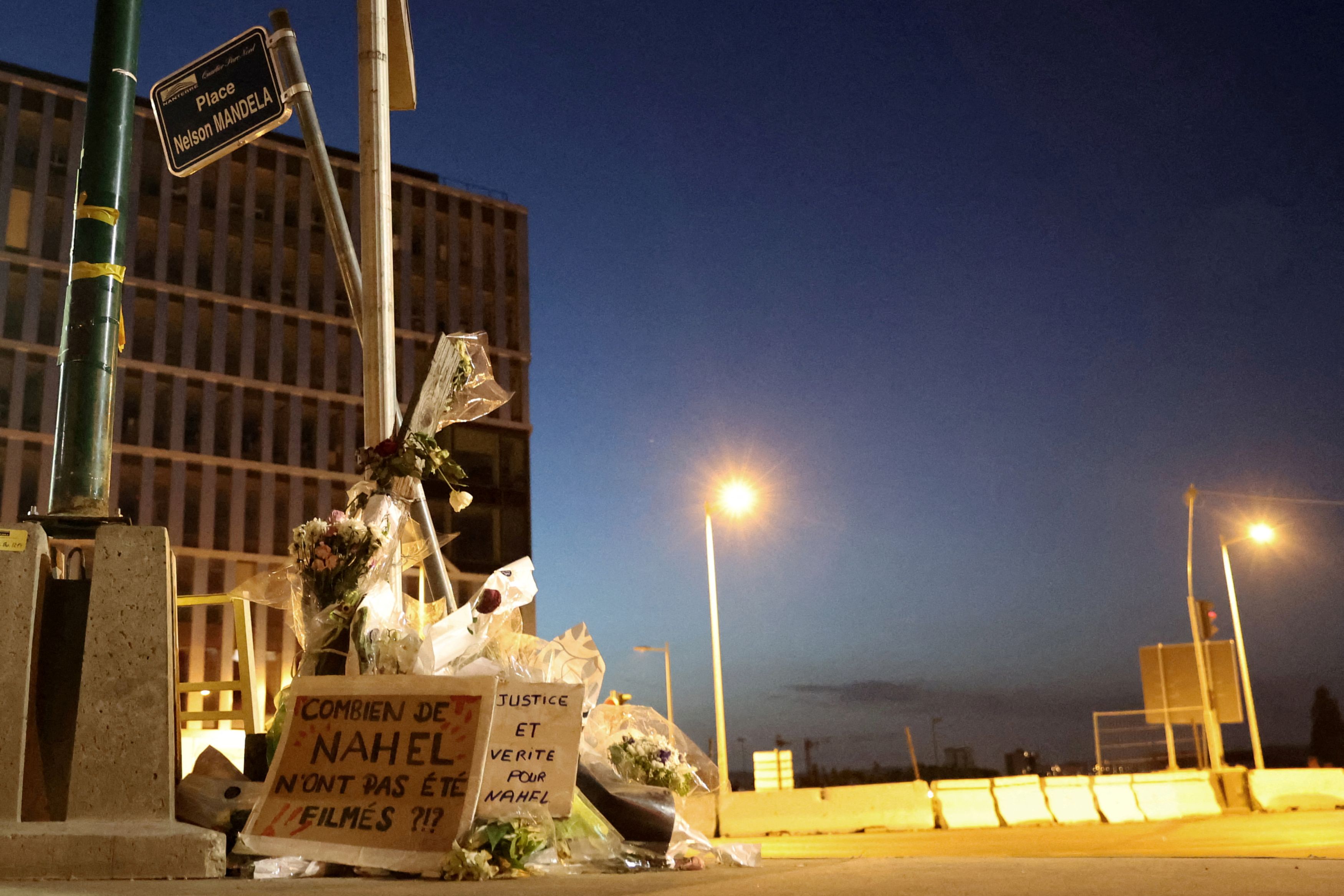 Flowers are seen at Nelson Mandela Square, where Nahel, a 17-year-old teenager was killed by a French police officer during a traffic stop, in Nanterre, France, July 2, 2023. /Reuters