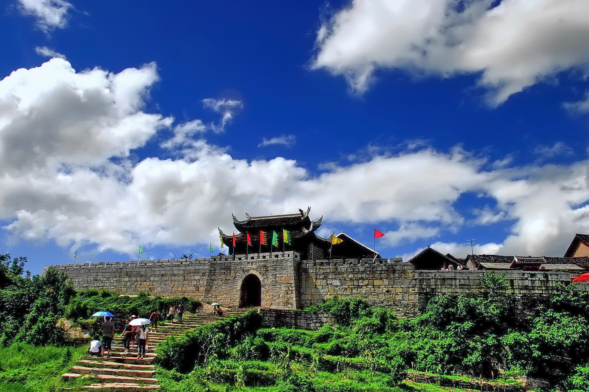 This undated photo shows the city walls surrounding Qingyan ancient town in Guiyang, southwest China's Guizhou Province. Established in 1378 by Zhu Yuanzhang, the first emperor of China's Ming Dynasty (1368-1644), Qingyan was historically a key military fortress and trade hub. /Photo provided to CGTN