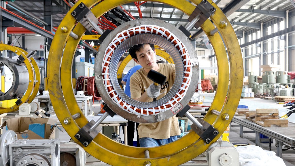 A staff working in a factory plant in southeast China's Fujian Province, June 17, 2023. /CFP