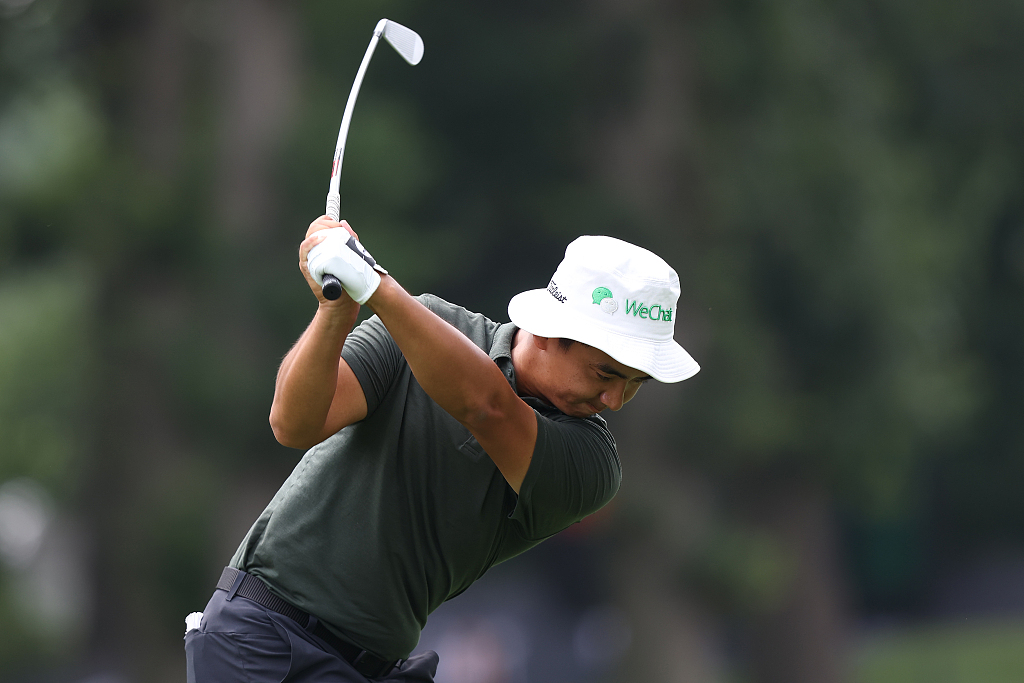 Dou Zecheng of China tees off on the 9th tee during the third round of the Rocket Mortgage Classic at the Detroit Country Club in Detroit, U.S., July 1, 2023. /CFP