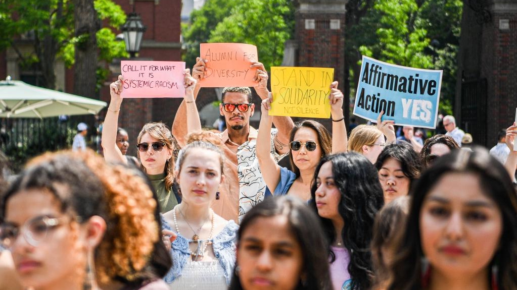 Participants march and chant slogans at a rally on Harvard University campus in Cambridge, Massachusetts on July 1, 2023 protesting the Supreme Court's ruling against affirmative action. /Xinhua