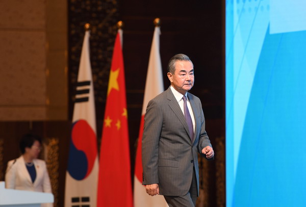 Wang Yi attends the opening ceremony of the 2023 International Forum for Trilateral Cooperation in Qingdao, July 3, 2023. /Chinese Foreign Ministry