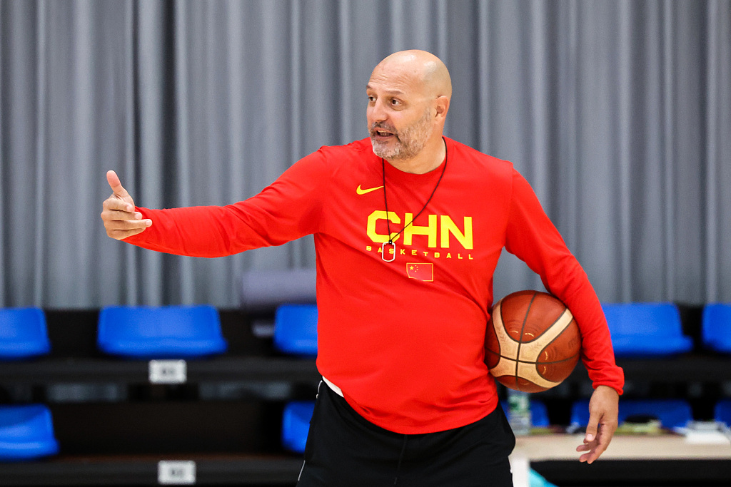 Aleksandar Djordjevic, head coach of China, looks on during a training session in Qingdao, east China's Shandong Province, July 3, 2023. /CFP