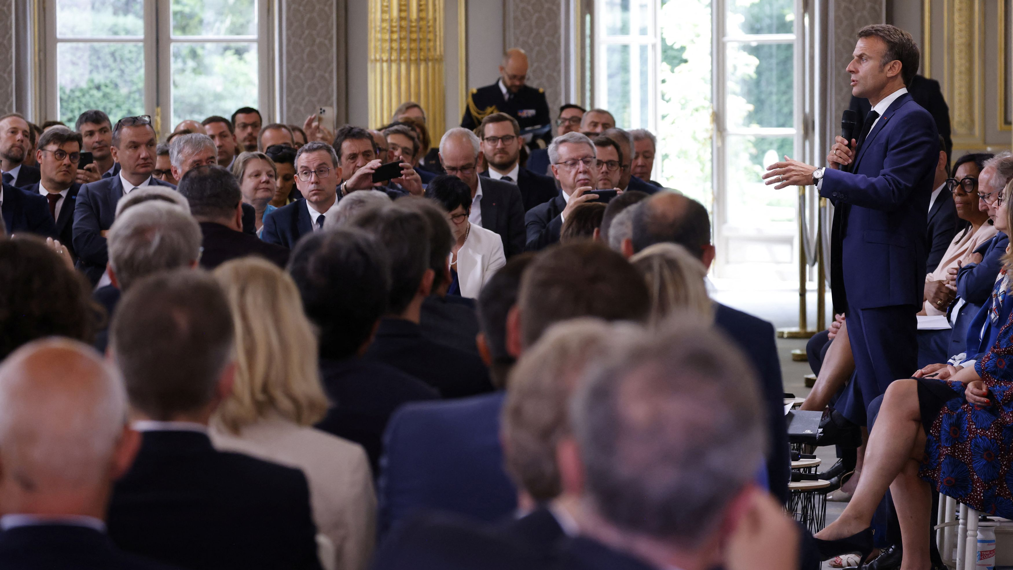 French President Emmanuel Macron addresses mayors of cities affected by the violent clashes that erupted after a teen was shot dead by police last week, during a meeting at the presidential Elysee Palace in Paris, France, July 4, 2023. /Reuters