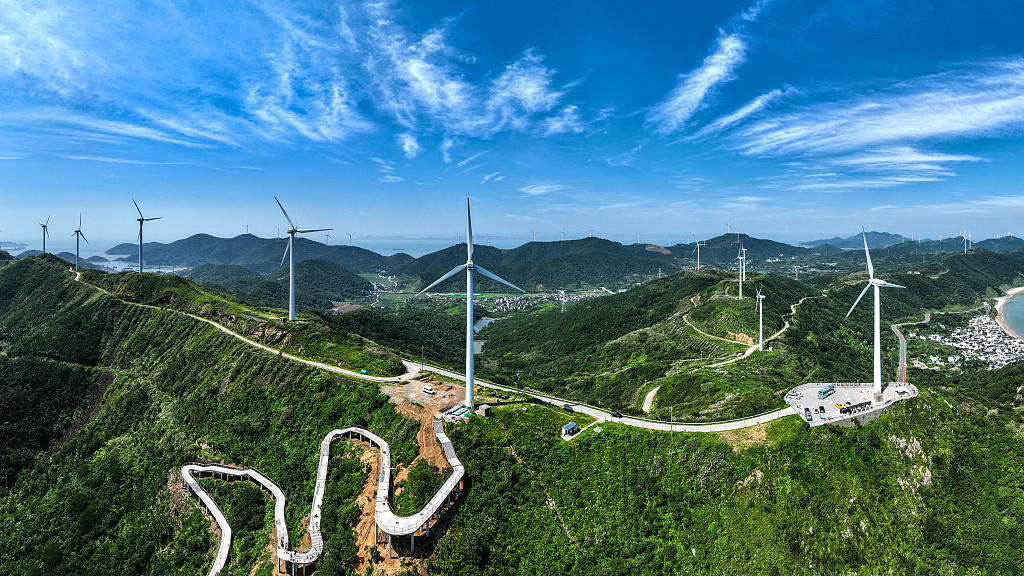 A view of wind turbines stand on mountain area in Zhoushan City, east China's Zhejiang province, July 2, 2023. /CFP
