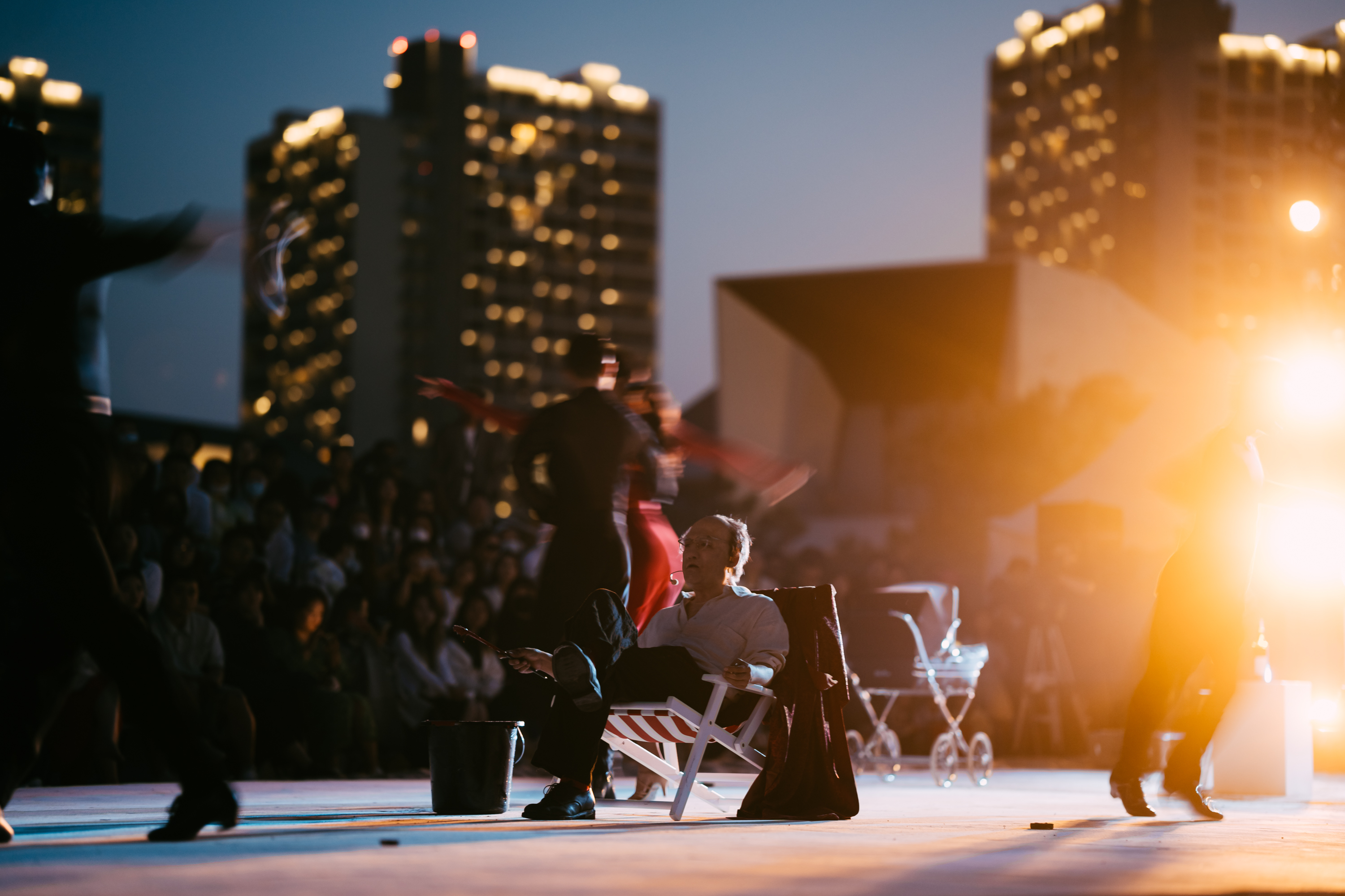 An actor takes part in an outdoor production of 