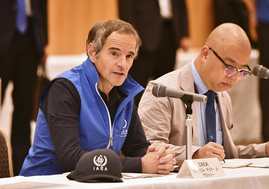 International Atomic Energy Agency Director General Rafael Grossi (L) speaks at a meeting with Japanese central government officials and municipal government heads held in Iwaki in the northeastern Japan prefecture of Fukushima, July 5, 2023. /CFP