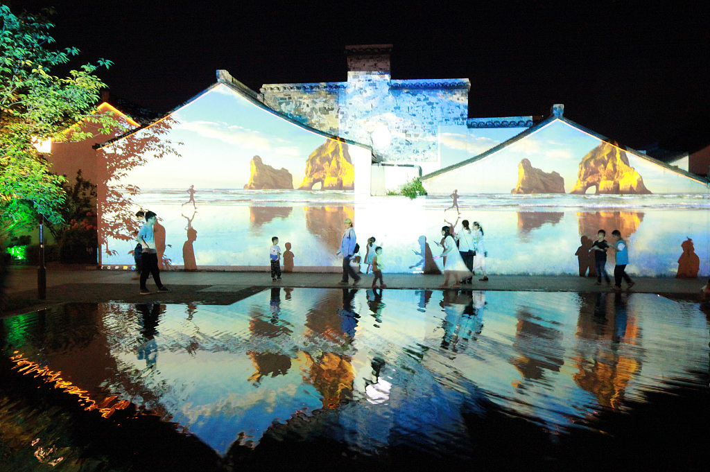 Buildings in Qingguo Alley are decorated with colorful LED lights, May 14, 2023. /CFP