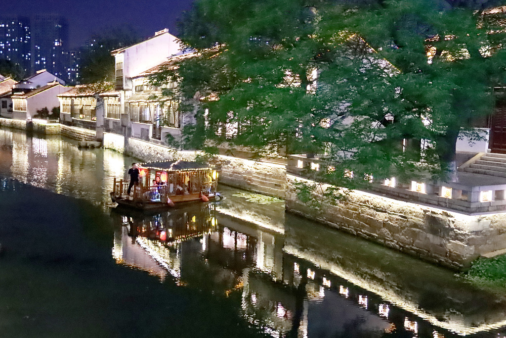 Buildings in Qingguo Alley are decorated with colorful LED lights, May 14, 2023. /CFP