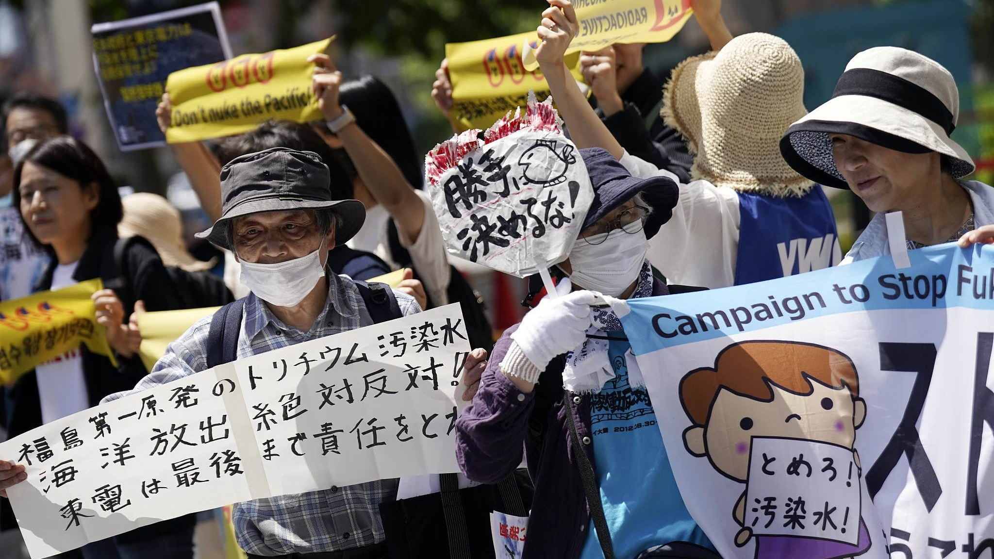 Dozens of protesters gather for a rally outside the TEPCO headquarters building, Tokyo, Japan, May 16, 2023. /CFP