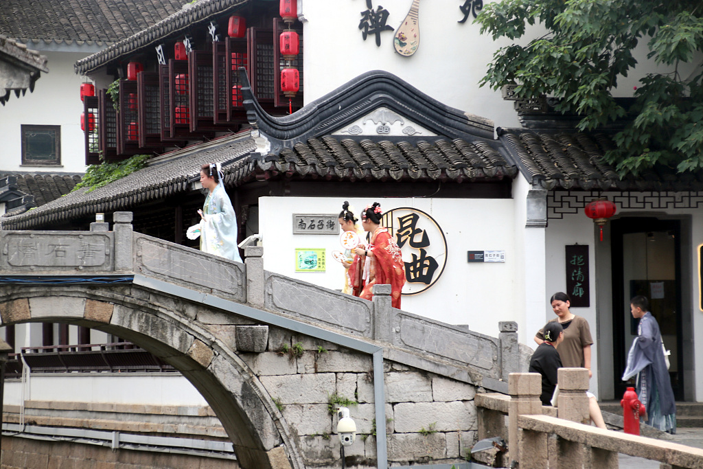 Tourists walk at the Pingjiang historic and cultural block in Suzhou, Jiangsu Province, July 7, 2023. /CFP