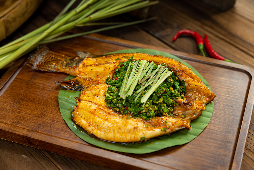 A file photo of a signature Yunnan dish: lemongrass grilled fish /CFP