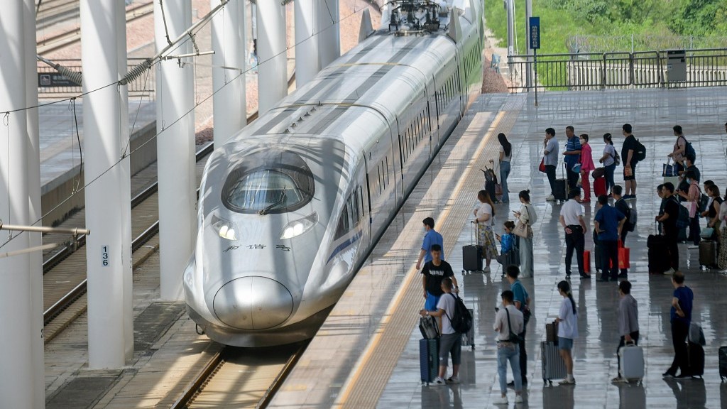 Passengers wait to board a train in central China's Henan Province, July 1, 2023. /CFP