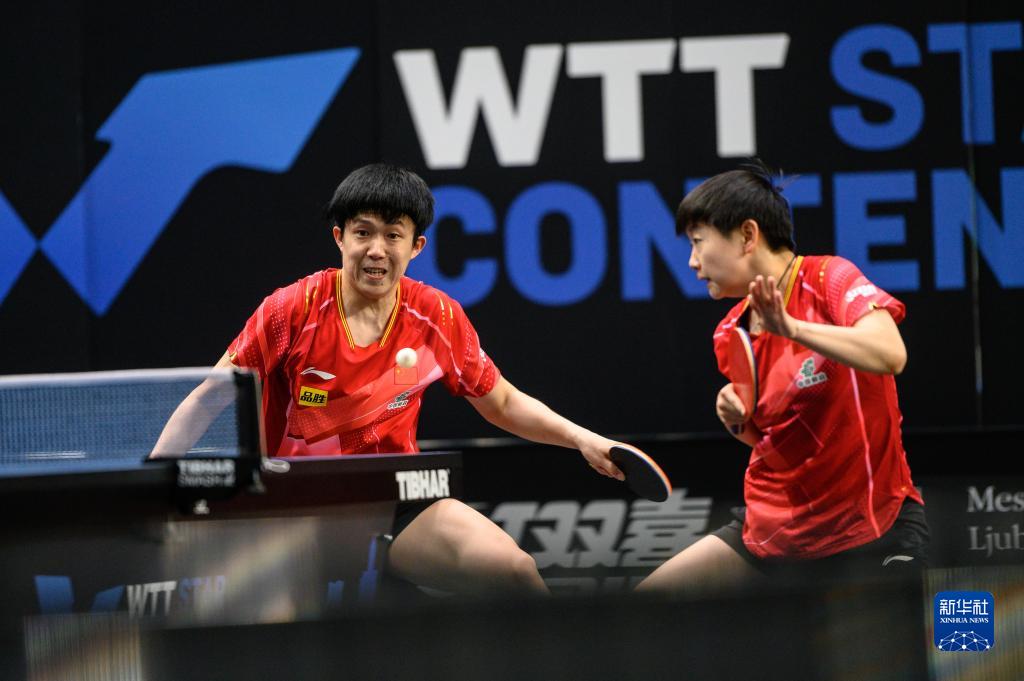 China's Wang Chuqin (L) and Sun Yingsha compete in the mixed doubles semifinal at the World Table Tennis Star Contender Ljubljana in Slovenia, July 7, 2023. /Xinhua