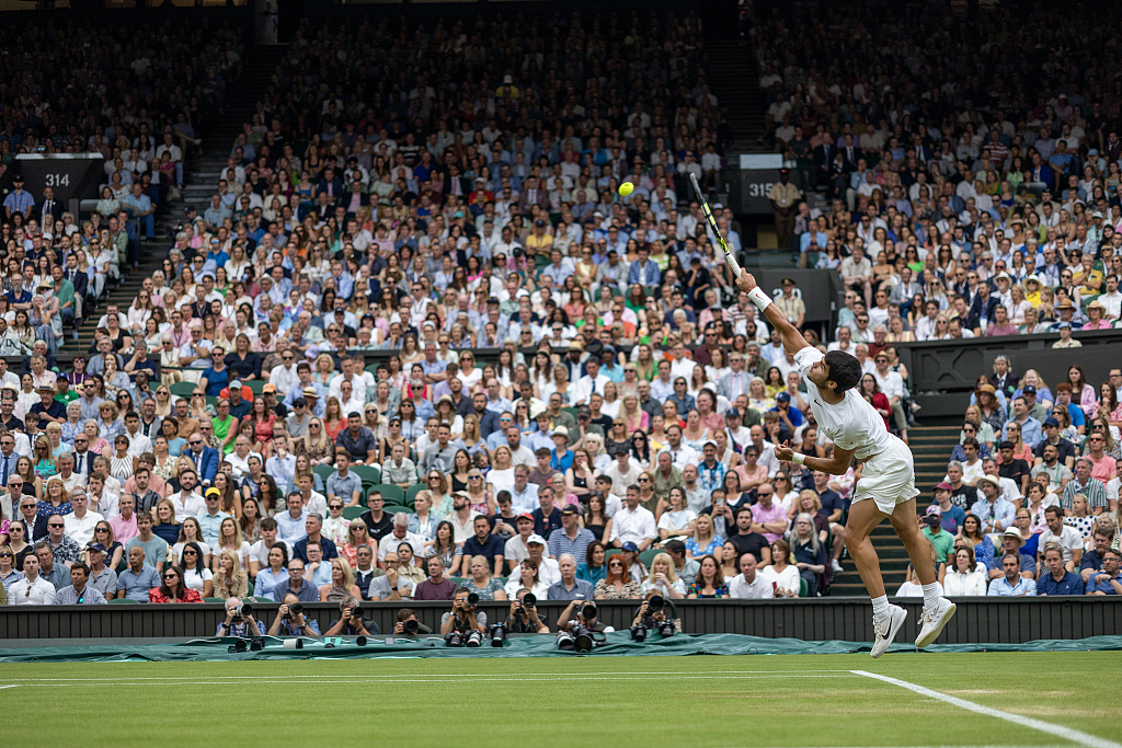 Carlos Alcaraz of Spain serves against Nicolas Jarry of Chile (not pictured) during their match at the Wimbledon tennis championships in London, England, July 8, 2023. /CFP