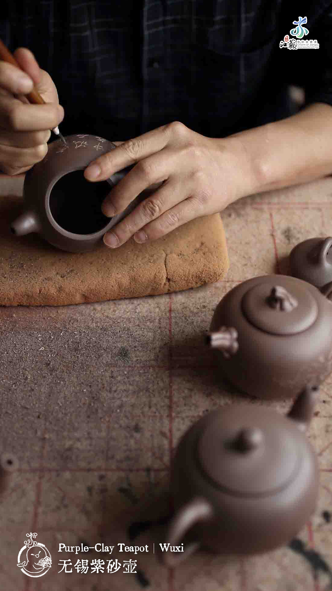 Undated photo shows a craftsman making a purple clay teapot in Wuxi, Jiangsu Province. /Photo provided to CGTN