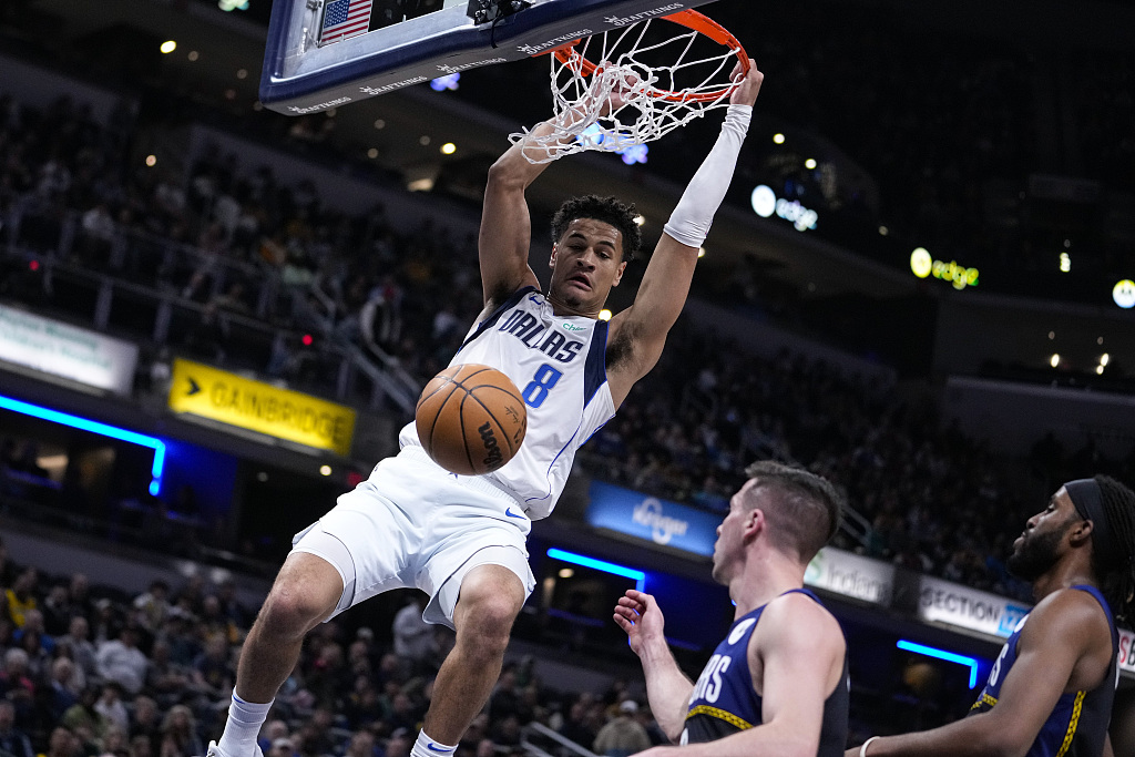 Josh Green (#8) of the Dallas Mavericks dunks in the game against the Indiana Pacers at Gainbridge Fieldhouse in Indianapolis, Indiana, March 27, 2023. /CFP