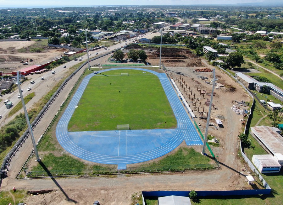 An aerial photo taken on May 4, 2022, shows the Chinese-built athletic track and the football pitch under a Stadium Project for the 2023 Pacific Games in Honiara, the Solomon Islands. /Xinhua