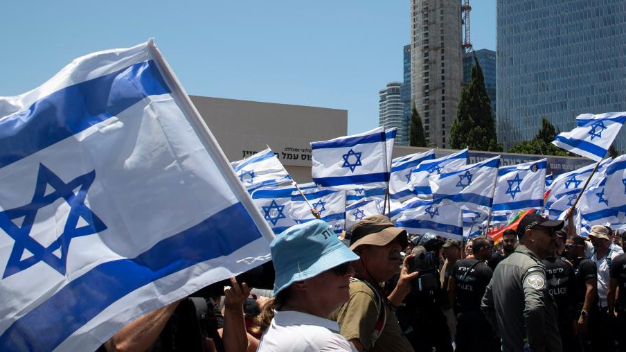 People take part in a protest against the government's plan to overhaul the judiciary in Tel Aviv, Israel, July 11, 2023. /Xinhua