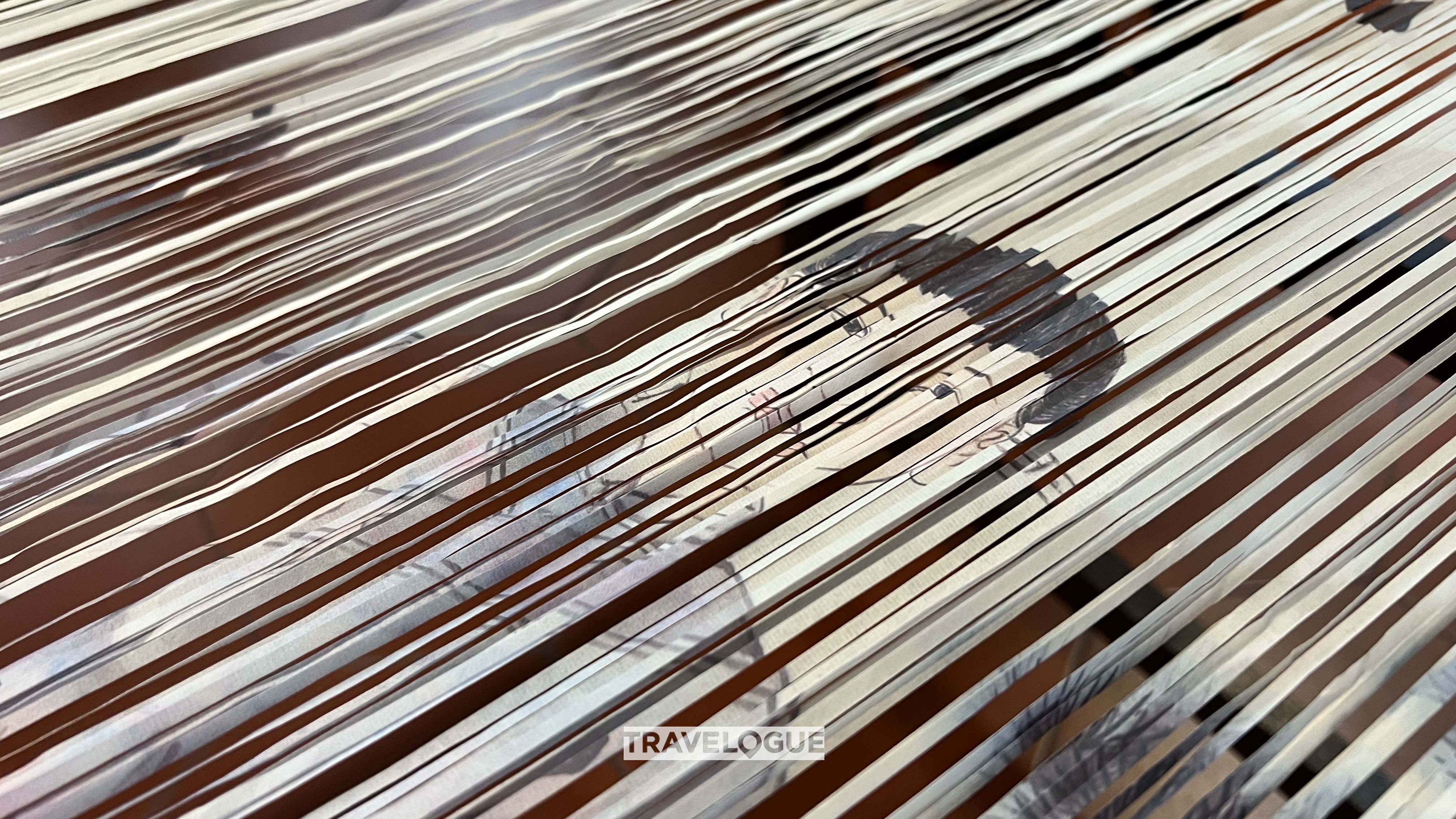 This undated photo shows paper-weaving painting in Yongchun County, Quanzhou, Fujian Province. /CGTN