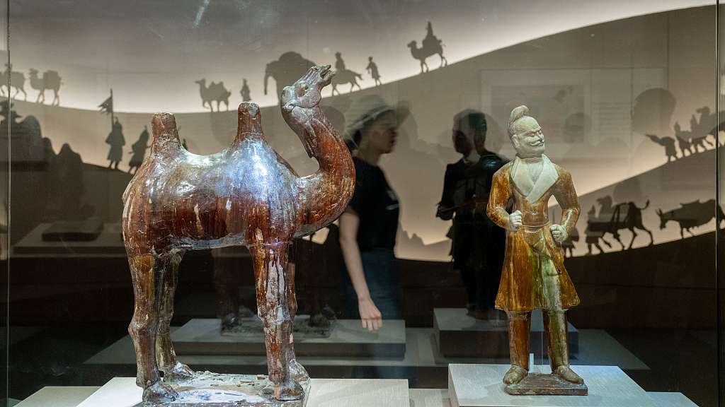 Photo taken on July 12, 2023 shows artifacts on display at the exhibition titled 