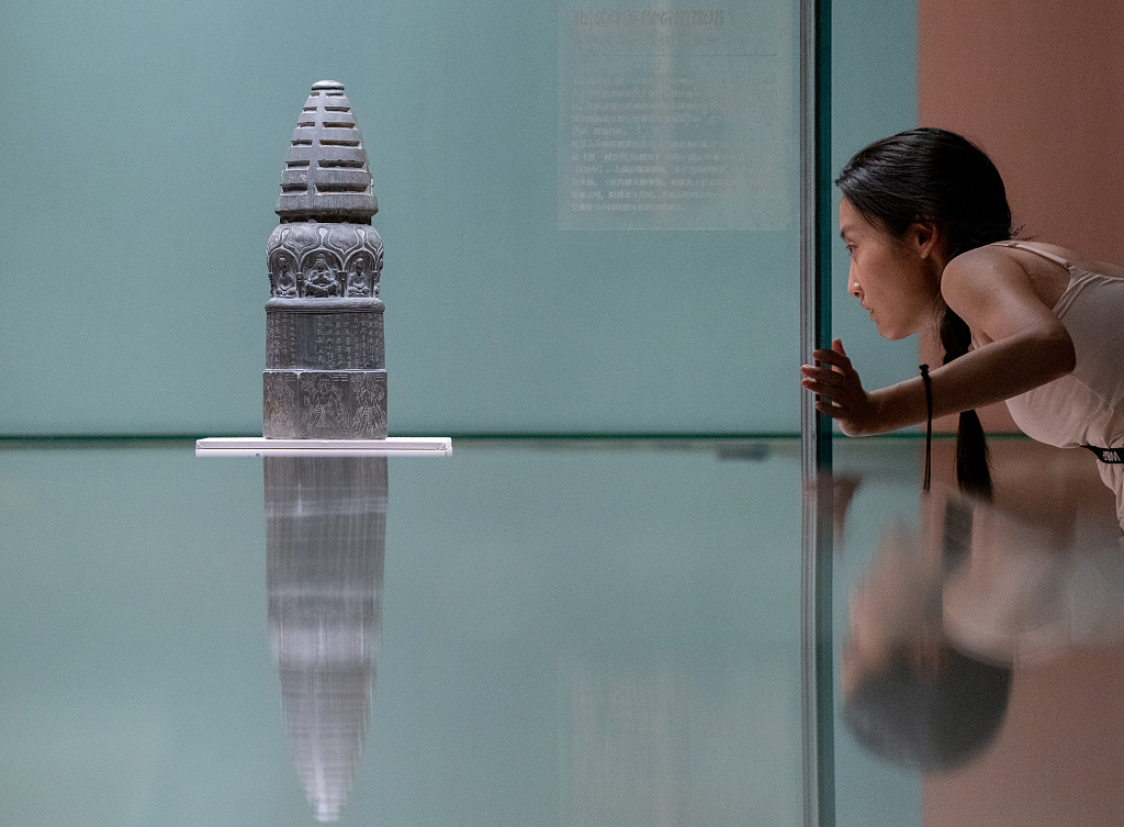 Photo taken on July 12, 2023 shows a stone pagoda on display at the exhibition titled 