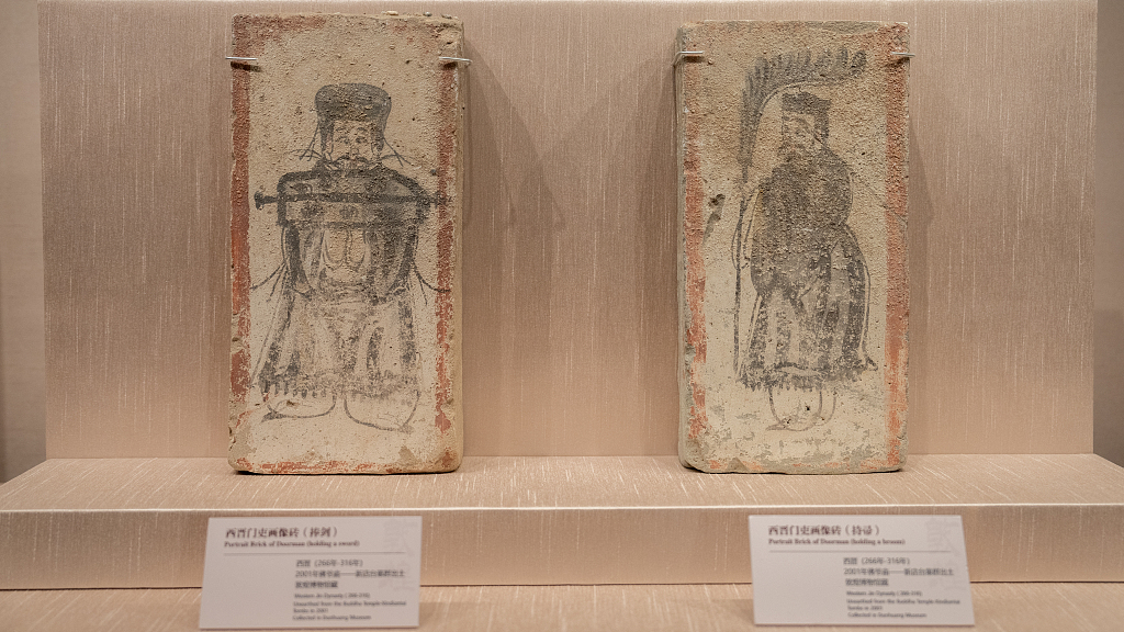 Photo taken on July 12, 2023 shows painted bricks on display at the exhibition titled 