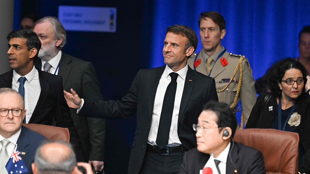 French President Emmanuel Macron arrives for a NATO meeting with the organization's Indo-Pacific partners during the NATO summit, Vilnius, Lithuania, July 12, 2023. /CFP