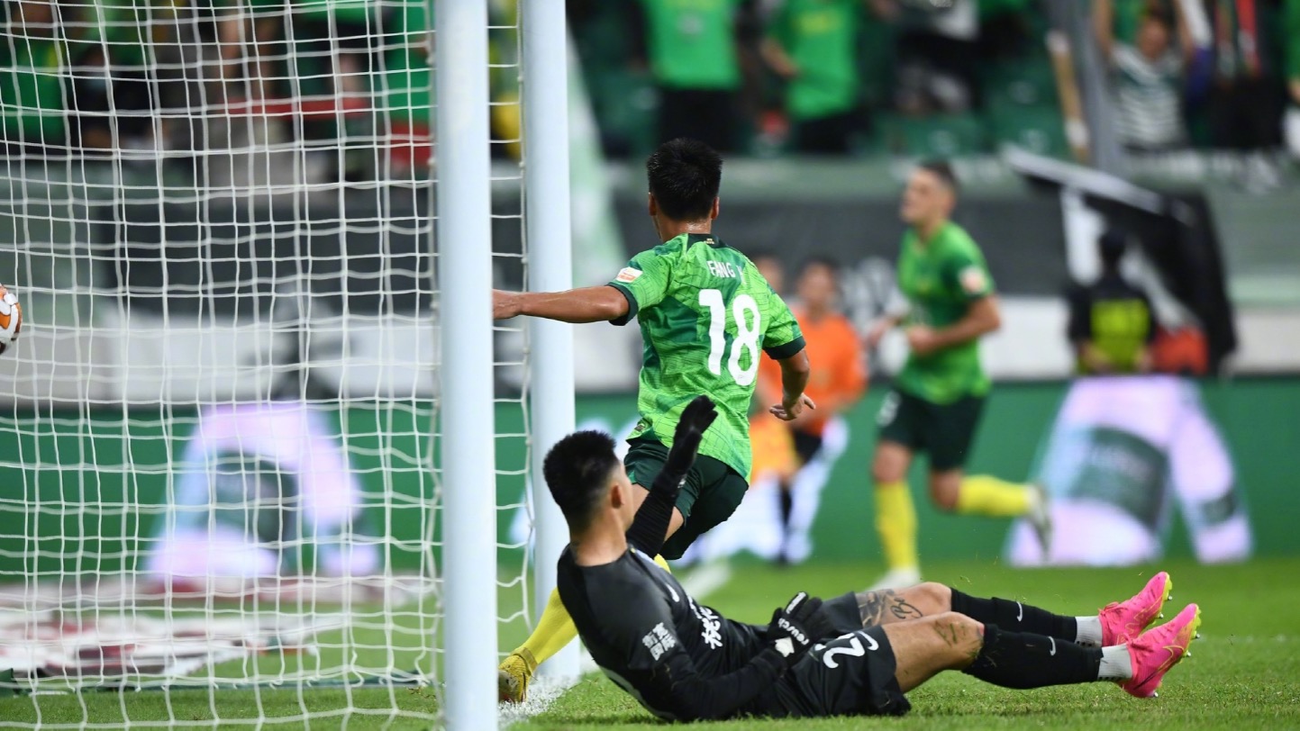 Beijing Guoan's Fang Hao (C) breaks the deadlock during his team's Chinese Super League clash with Wuhan Three Towns at the new Workers' Stadium in Beijing, China, July 16, 2023. /Beijing Guoan