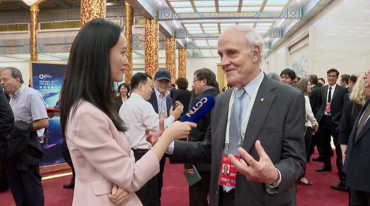 Nobel laureate David Jonathan Gross speaks with CGTN on why learning basic science is important at the Great Hall of the People in Beijing, July 16, 2023. /CGTN 