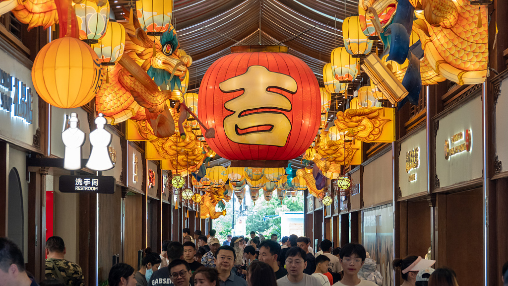 Chinese lanterns hang over an indoor commercial street at Yuyuan Garden shopping mall in east China's Shanghai, July 13, 2023. /CFP