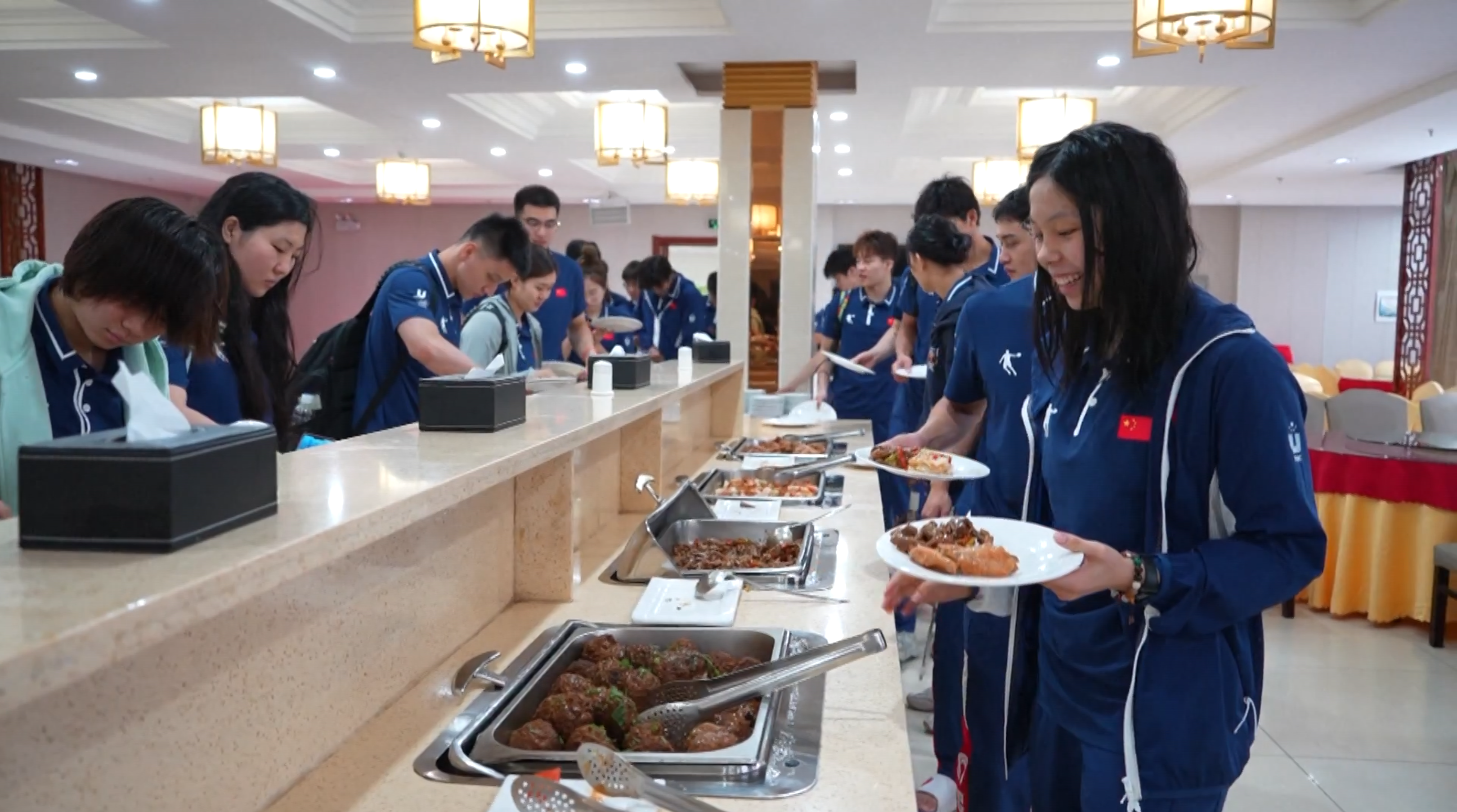 Athletes of the Chinese swimming team have dinner at the training base in Changchun, northeast China's Jilin Province, July 16, 2023. /China Media Group