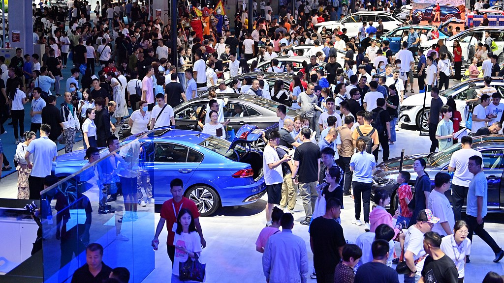 Consumers at the China Changchun International Auto Expo in northeast China's Jilin Province, July 15, 2023. /CFP