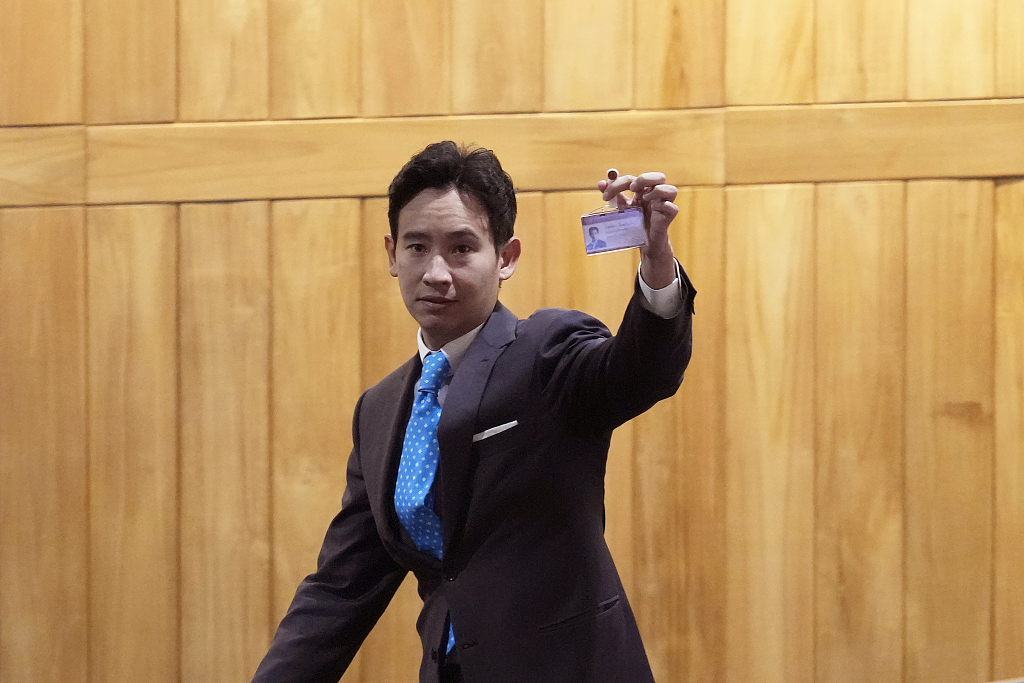 Pita Limjaroenrat, the leader of the Move Forward Party, shows his lawmaker ID during a meeting at Parliament in Bangkok, Thailand, July 19, 2023. /CFP