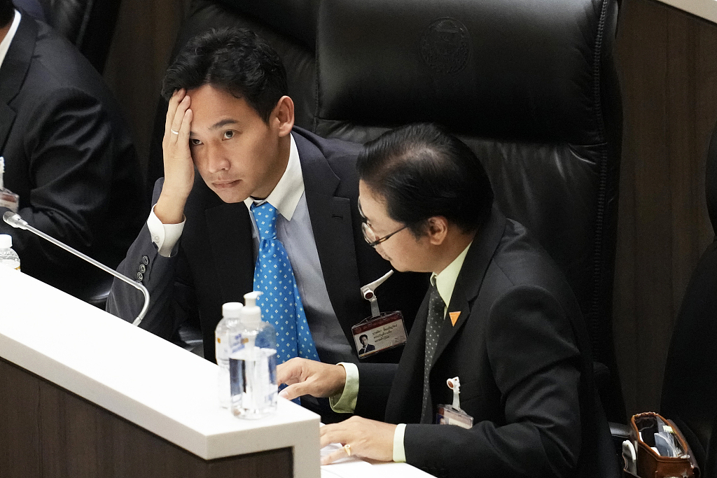 Pita Limjaroenrat, left, the leader of Move Forward Party, at a meeting in parliament in Bangkok, Thailand, Wednesday, July 19, 2023. 