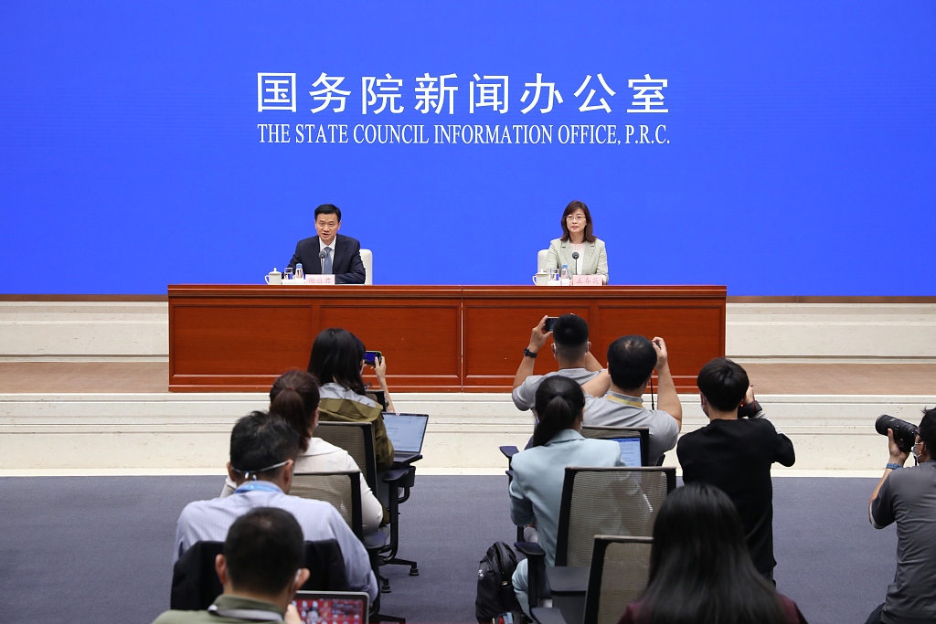 China's State Council Information Office holds a press conference on foreign exchange settlement and sales in the first half of 2023. /CFP