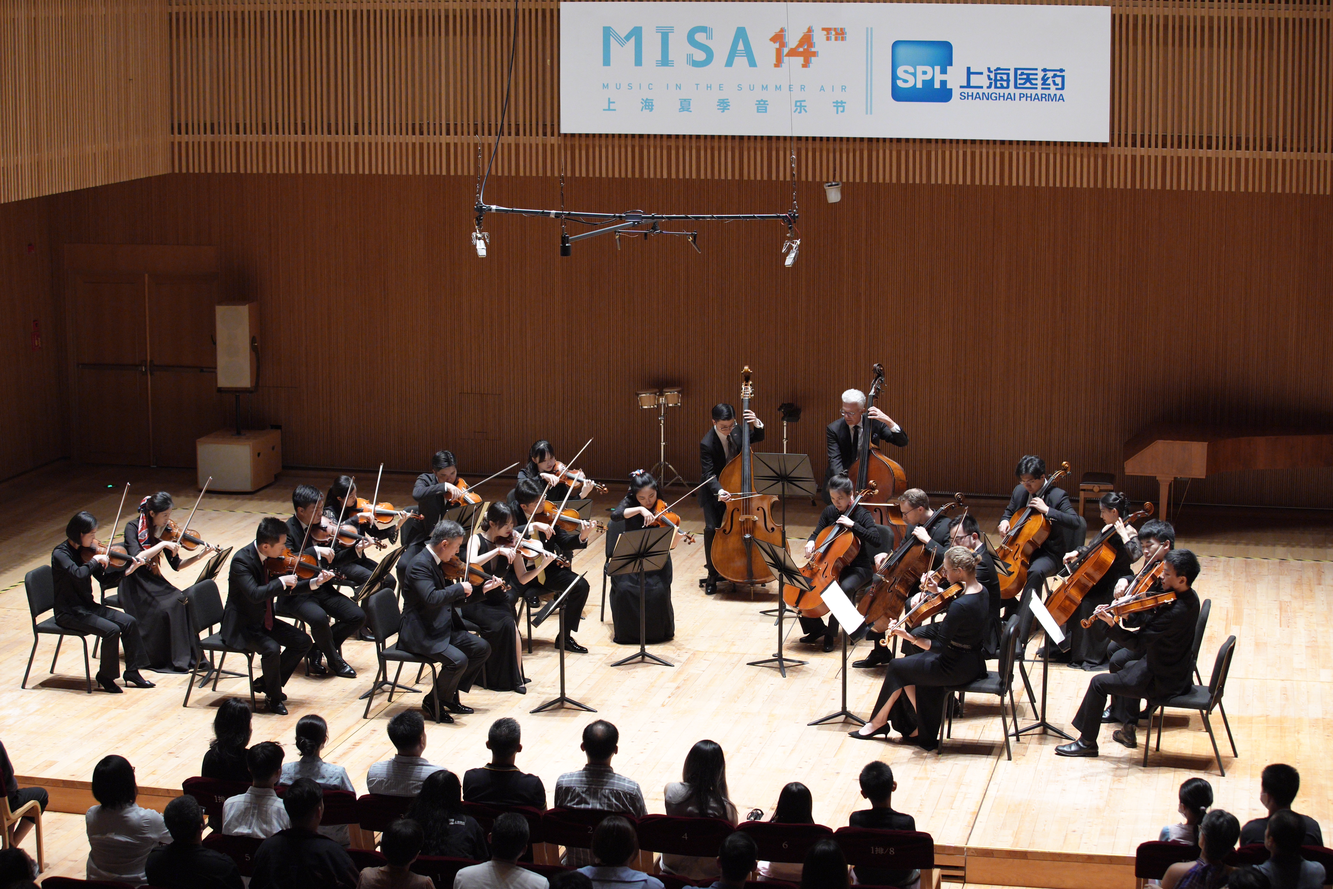Students of the Shanghai Orchestra Academy perform with musicians of the New York Philharmonic Orchestra and Shanghai Symphony Orchestra in Shanghai on July 12, 2023. /Chaokai Shen
