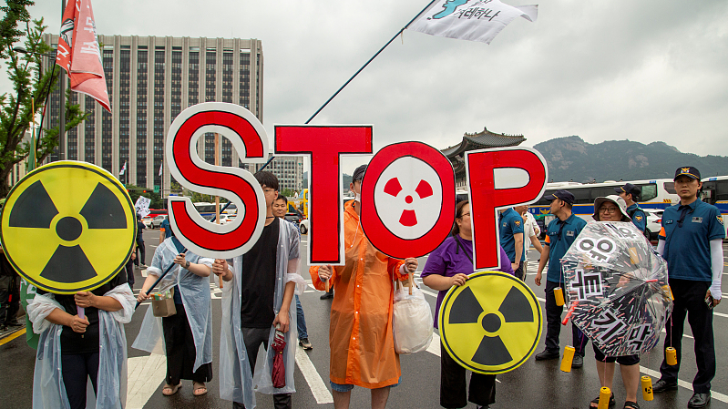 People protest against Japan's plan to release its nuclear-contaminated water into the Pacific Ocean, in Seoul, South Korea, July 15, 2023. /CFP