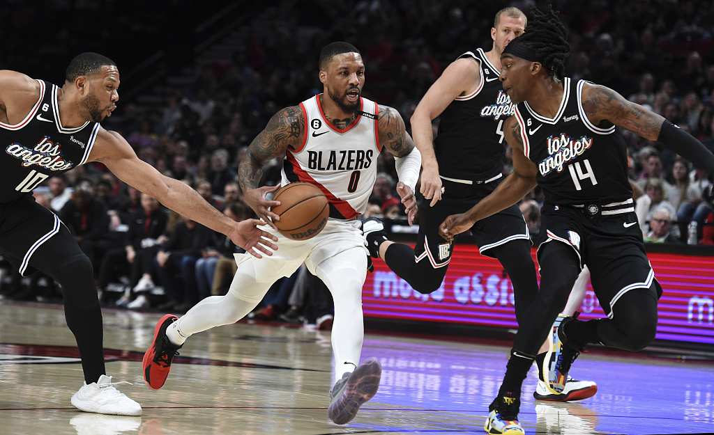 Damian Lillard (#0) of the Portland Trail Blazers drives in the game against the Los Angeles Clippers at Moda Center in Portland, Oregon, March 19, 2023. /CFP