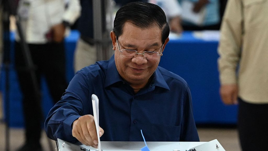 Cambodia's Prime Minister Hun Sen casts his vote at a polling station in Kandal province on July 23, 2023 during the general elections.