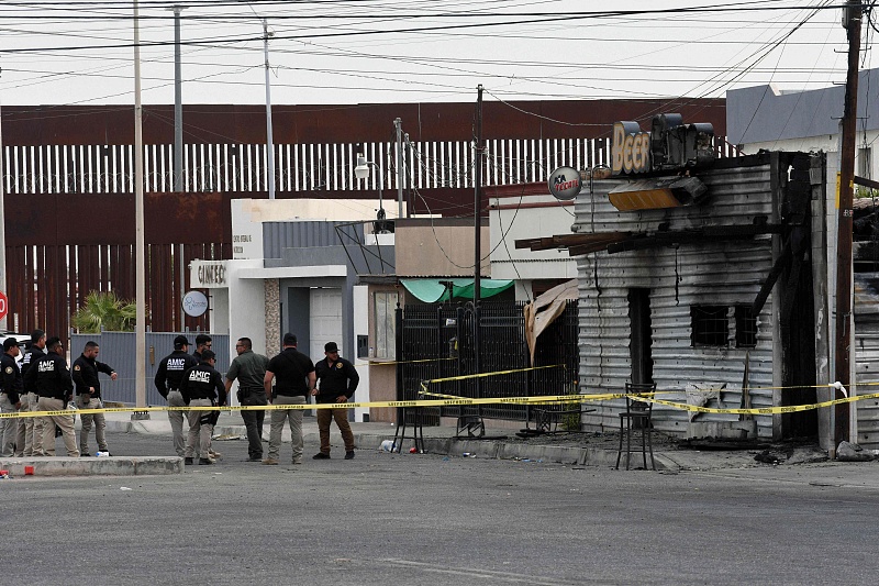 Members of the local attorney's office work outside a bar that was set alight, leaving 11 people dead in the town of San Luis Rio Colorado, Sonora state, Mexico, July 22, 2023. /CFP