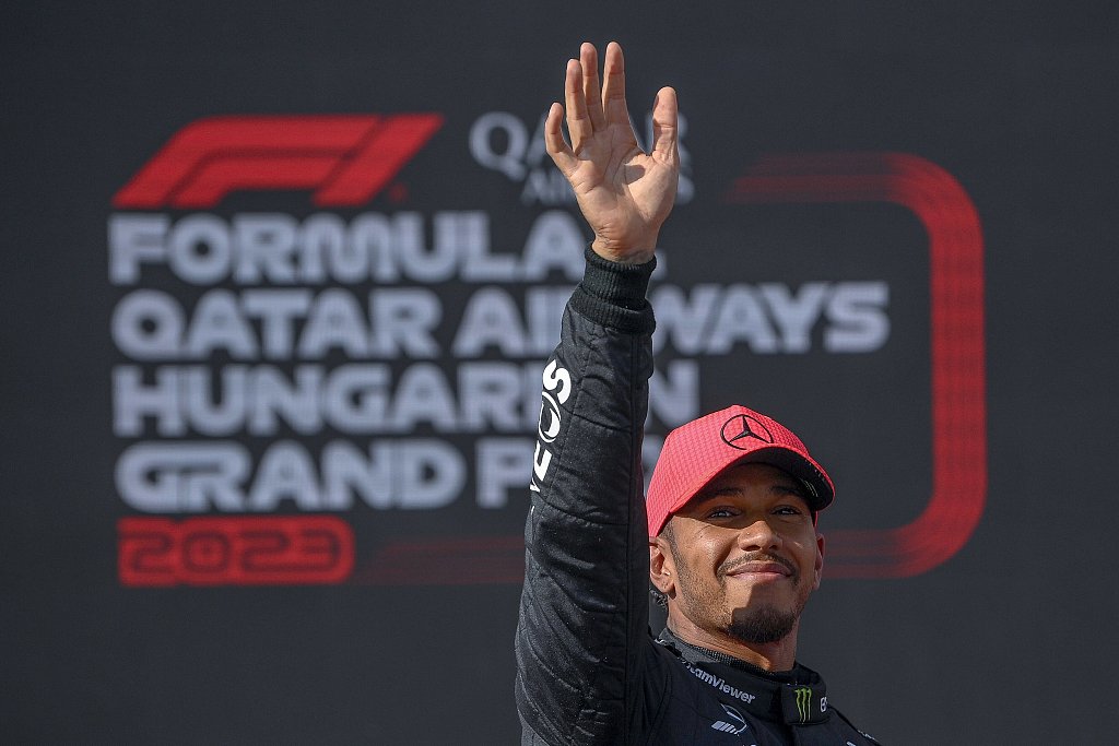 Lewis Hamilton of Mercedes reacts after clocking the fastest time during qualifying for the Hungarian Grand Prix at the Hungaroring circuit in Mogyorod, Hungary, July 22, 2023. /CFP