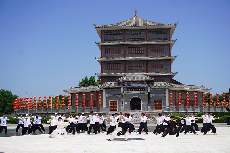 International students practice with Tai Chi masters in Henan Province, July 7, 2023. /CFP