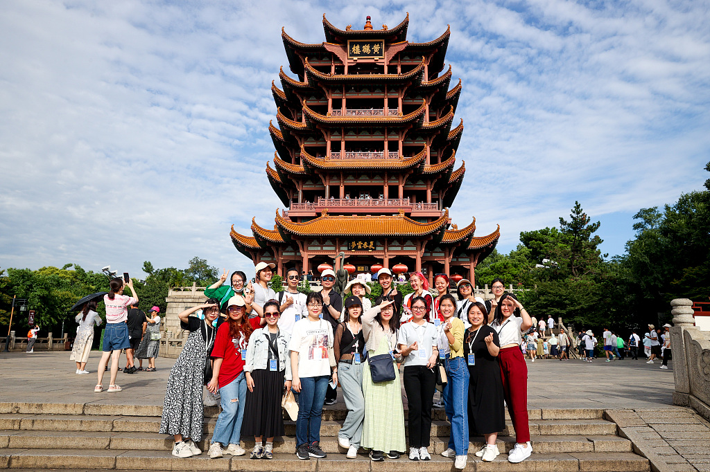This photo taken on July 5, 2023, shows participants of the 9th ASEAN-China Young Leaders Exchange Festival visiting the Yellow Crane Tower in Wuhan, Hubei Province, China. /CFP
