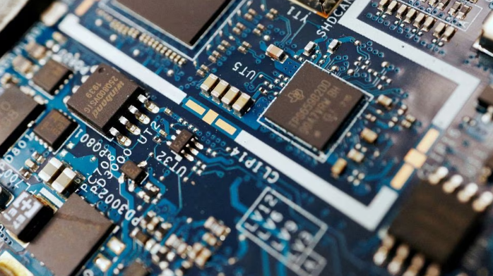 Semiconductor chips are seen on a circuit board of a computer in the illustration picture, February 25, 2022. /Reuters